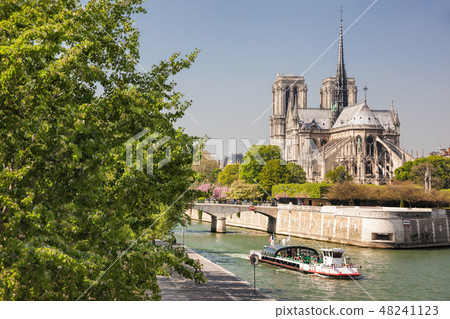 Paris, Notre Dame with boat on Seine in France Paris, Notre Dame with boat on Seine in France 48241123