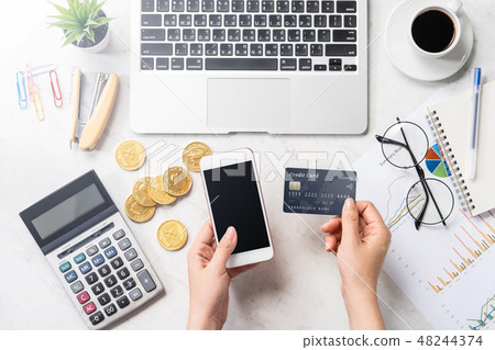 Female hand credit card mobile phone billing consumption tax support card phone payment mockup Female hand credit card mobile phone billing consumption tax support card phone payment mockup 48244374