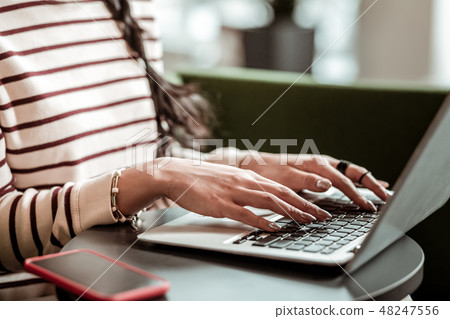 Close up of female hands that typing message 48247556