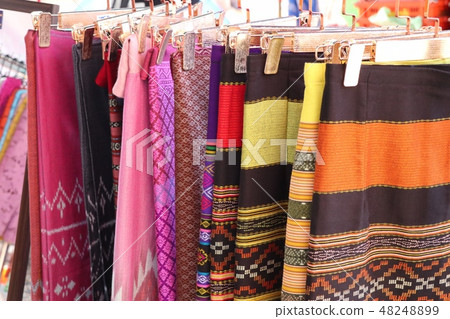 shop clothes for sales at market 48248899