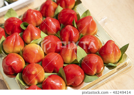 Peach shaped mung beans of Thai dessert Peach shaped mung beans of Thai dessert 48249414