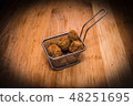 Meatballs on steel food basket 48251695