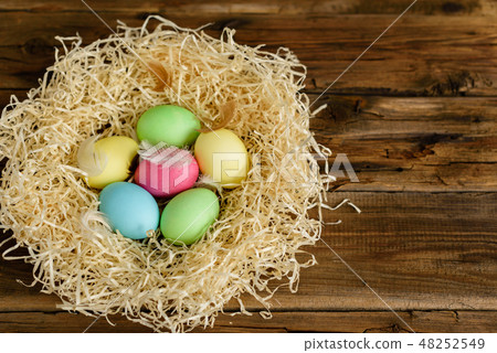 Easter cake and colorful eggs on a dark background 48252549