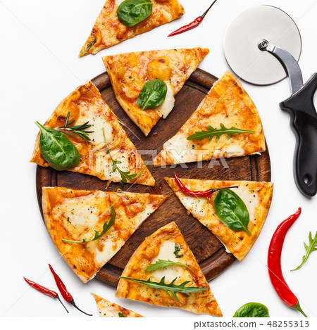 Delicious fresh pizza served on wooden board Delicious fresh pizza served on wooden board 48255313