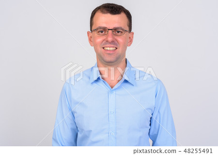 Face of happy businessman with eyeglasses smiling Face of happy businessman with eyeglasses smiling 48255491