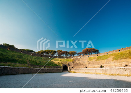 Pompeii, Italy. View Of Amphitheatre Of Pompeii In Sunny Day Pompeii, Italy. View Of Amphitheatre Of Pompeii In Sunny Day 48259465