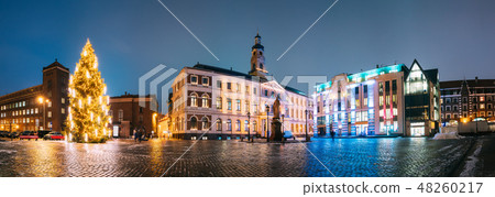 Riga, Latvia. Xmas Christmas Tree In Town Hall Square At Evening In Night Illuminations Lights Riga, Latvia. Xmas Christmas Tree In Town Hall Square At Evening In Night Illuminations Lights 48260217