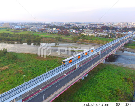 "Tama City Monorail" crossing the Tappi Bridge-Aerial view with a drone (Hino City, Tokyo) "Tama City Monorail" crossing the Tappi Bridge-Aerial view with a drone (Hino City, Tokyo) 48261325