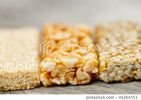 Assorted kozinaki, on the old vintage background. 48264351