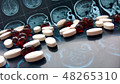 Pills on magnetic brain resonance scan background 48265310