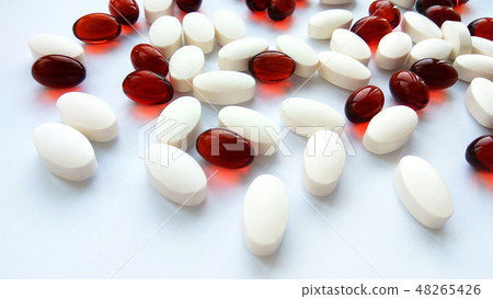 Red and white pharmaceutical medicine pills Red and white pharmaceutical medicine pills 48265426