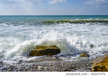 Splashing wave on the Black sea in the day. 48267470