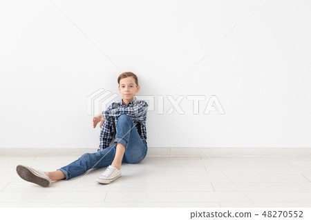 teenager, children and fashion concept - portrait of a fashion handsome boy on the white background teenager, children and fashion concept - portrait of a fashion handsome boy on the white background 48270552