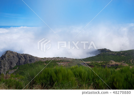 View over the clouds from mountain peak, Madeira 48270880