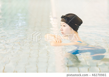 Sports gym young lady 48270981