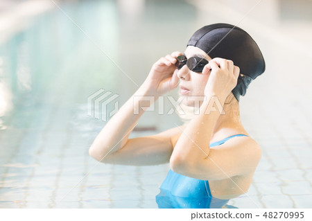 Sports gym young lady 48270995