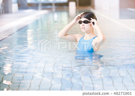 Sports gym young lady Sports gym young lady 48271001