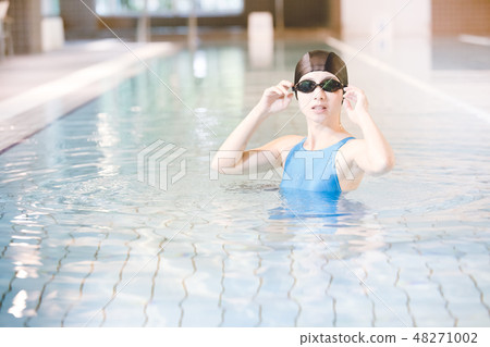 Sports gym young lady 48271002