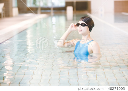 Sports gym young lady 48271003