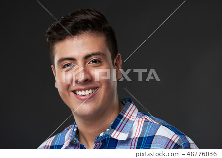 Studio portrait of young man 48276036
