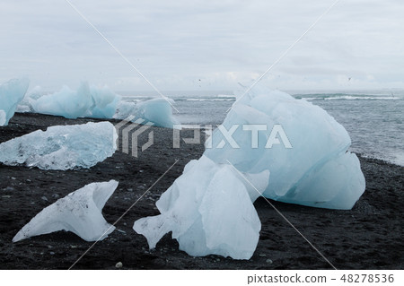 Icebergs on water,Jokulsarlon glacial lake,Iceland Icebergs on water,Jokulsarlon glacial lake,Iceland 48278536