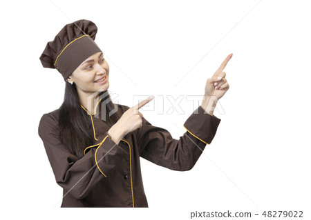 cheerful cook points fingers to the side 48279022