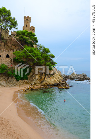 Castle on cliff by beach, Lloret de Mar, Spain 48279319