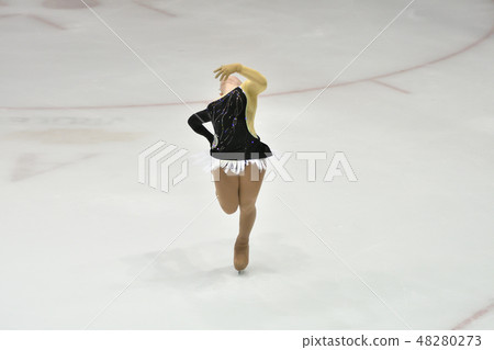 Girl ice skating Girl ice skating 48280273