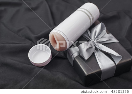Sex toy gift for man you love! Close-up photo... - Stock Photo [48281356]