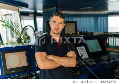 Marine navigational officer during navigational watch on Bridge 48283278