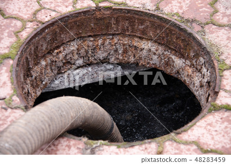 pumping sewage from the drain hole pumping sewage from the drain hole 48283459