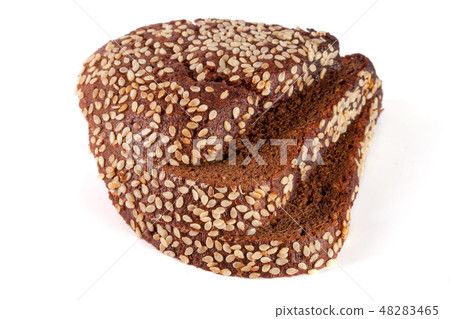 Three slices of black bread with sesame seeds isolated on white background Three slices of black bread with sesame seeds isolated on white background 48283465