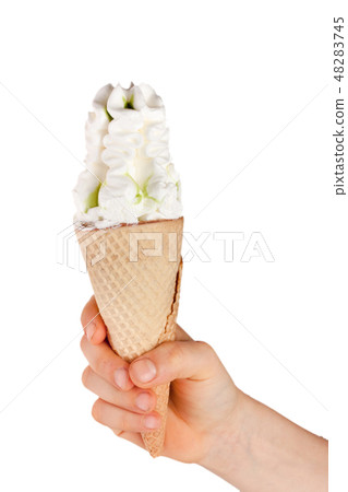 Ice cream cone in child's hand isolated on white background Ice cream cone in child's hand isolated on white background 48283745