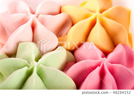 Colorful ice cream in the shape of a flower close-up top view 48284152