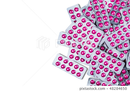Ibuprofen in pink tablet pills in blister pack  48284650