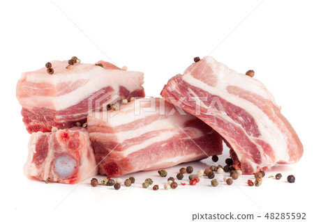 pieces of pork with peppercorn isolated on white background pieces of pork with peppercorn isolated on white background 48285592