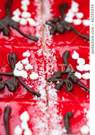 Fruit jelly cake on the market close up. Top view. Selective focus 48285934