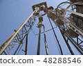 Old drilling rig against the blue sky 48288546