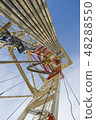 Drilling rig against the blue sky 48288550