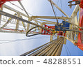 Drilling rig against the blue sky 48288551