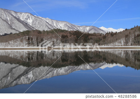 Lake Aokaki waiting for spring and Hakuba Miyama Lake Aokaki waiting for spring and Hakuba Miyama 48288586