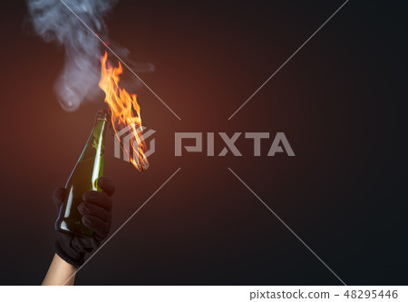 Molotov cocktail in activist hand Molotov cocktail in activist hand 48295446