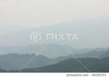 Landscape layers mountains in haze Landscape layers mountains in haze 48295541