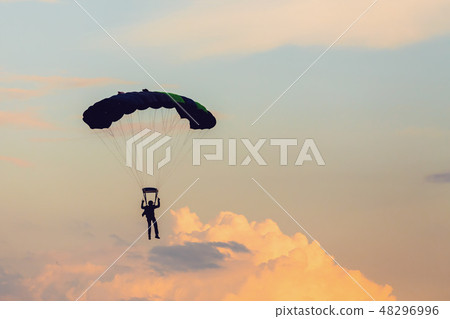 parachuting sport in sunset sky parachuting sport in sunset sky 48296996
