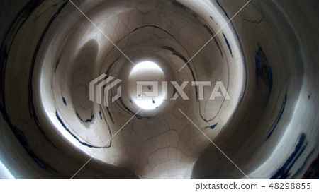 CHICAGO, ILLINOIS, UNITED STATES - DEC 12th, 2015: View from under the stainless steel Cloud Gate 48298855