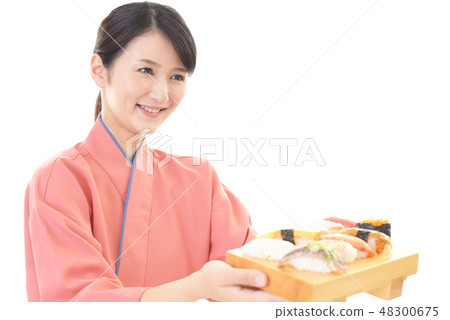 笑臉女服務員攜帶烹飪 笑臉女服務員攜帶烹飪 48300675