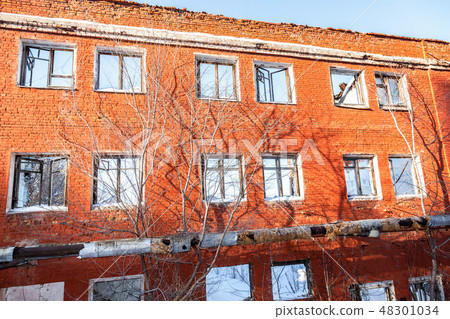 Abandoned and destroyed building from red brick Abandoned and destroyed building from red brick 48301034