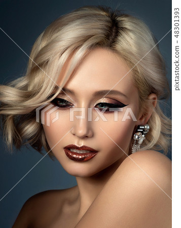 Portrait of beautiful woman with fashion make up Portrait of beautiful woman with fashion make up 48301393