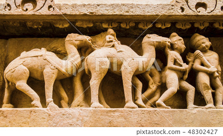 Soldiers with camels in Kahjuraho temple, India  48302427