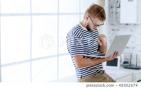 Successful businessman. Office worker. Portrait of bearded businessman. Serious businessman. Man Successful businessman. Office worker. Portrait of bearded businessman. Serious businessman. Man 48302874